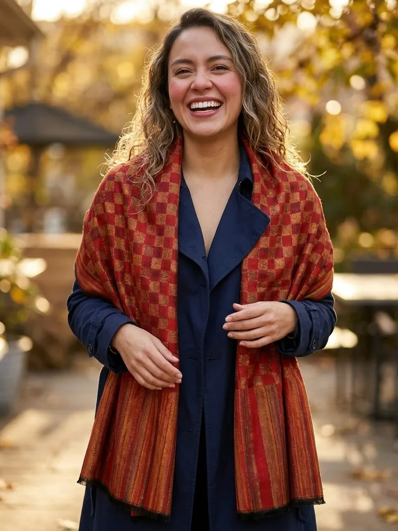 A stole open over the shoulders of a coat, both ends falling at the front
